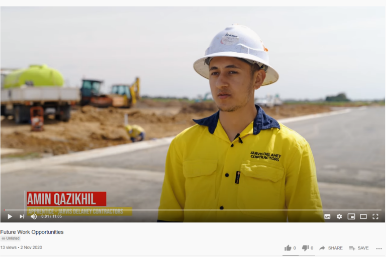 A snippet from a Youtube video featuring young construction workers