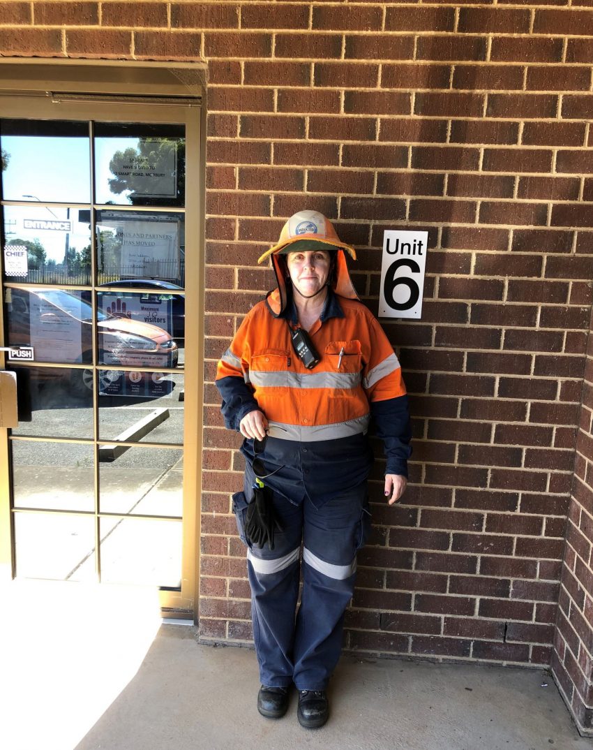 Female worker in high visibility work outfit