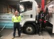Port Pirie Adelaide Truck driver Terrence stands next to his truck at work