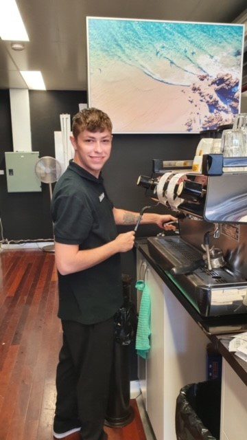 Daniel works in the cafe
